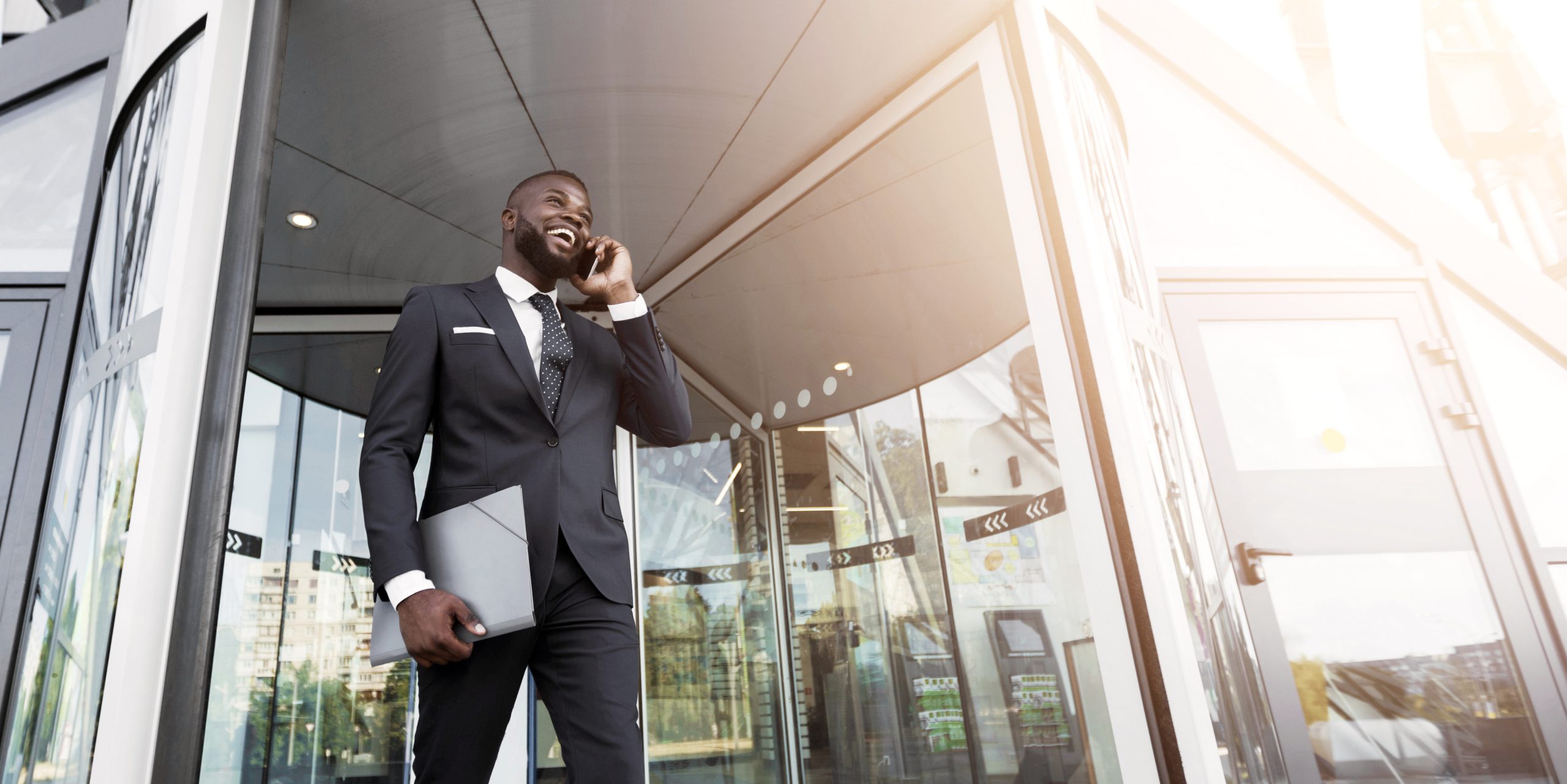 Professional business leader standing outside an office building